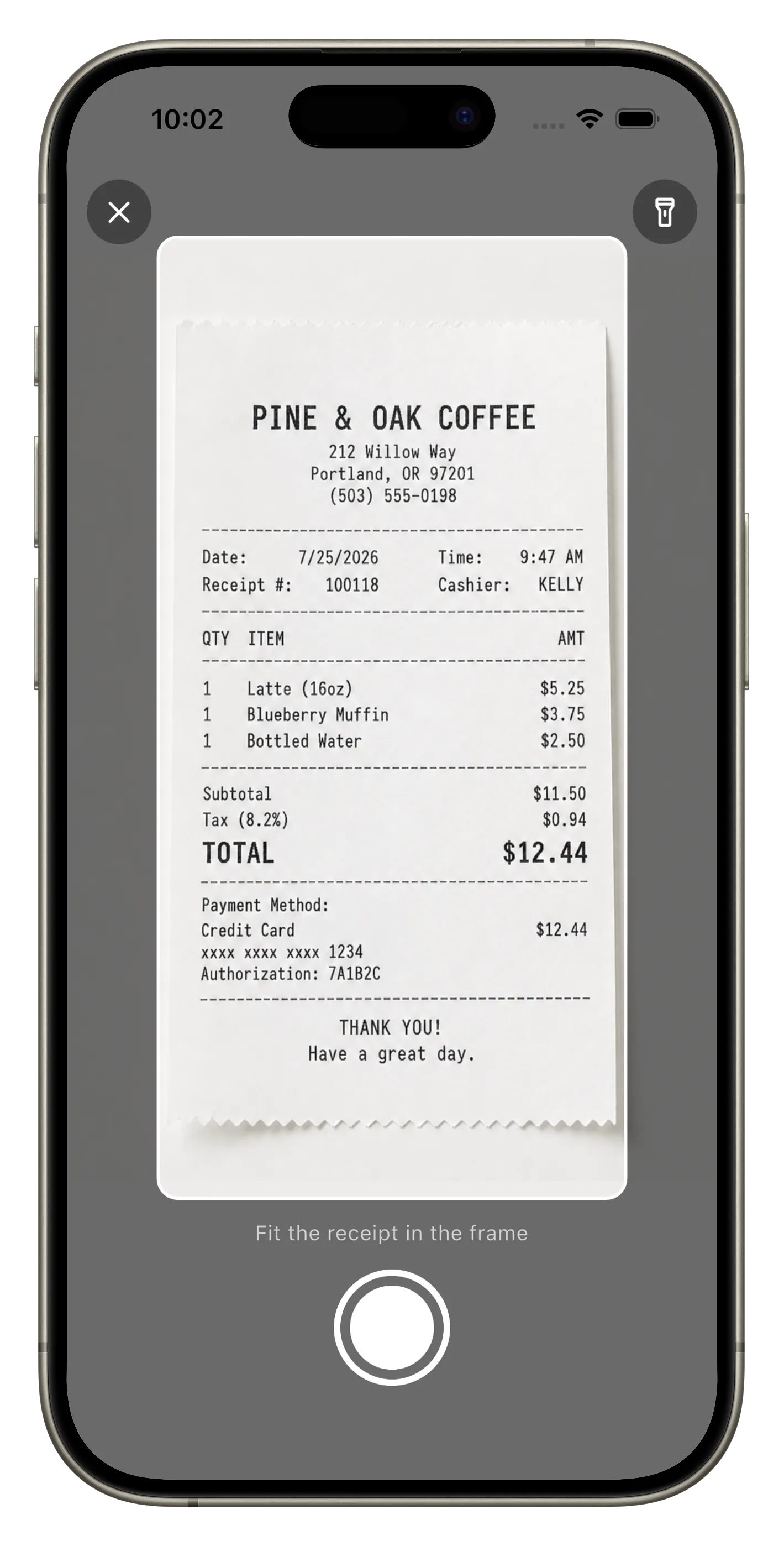 The Expensed document scanner with a coffee shop receipt held in the frame and the prompt "Fit the receipt in the frame" beneath it.